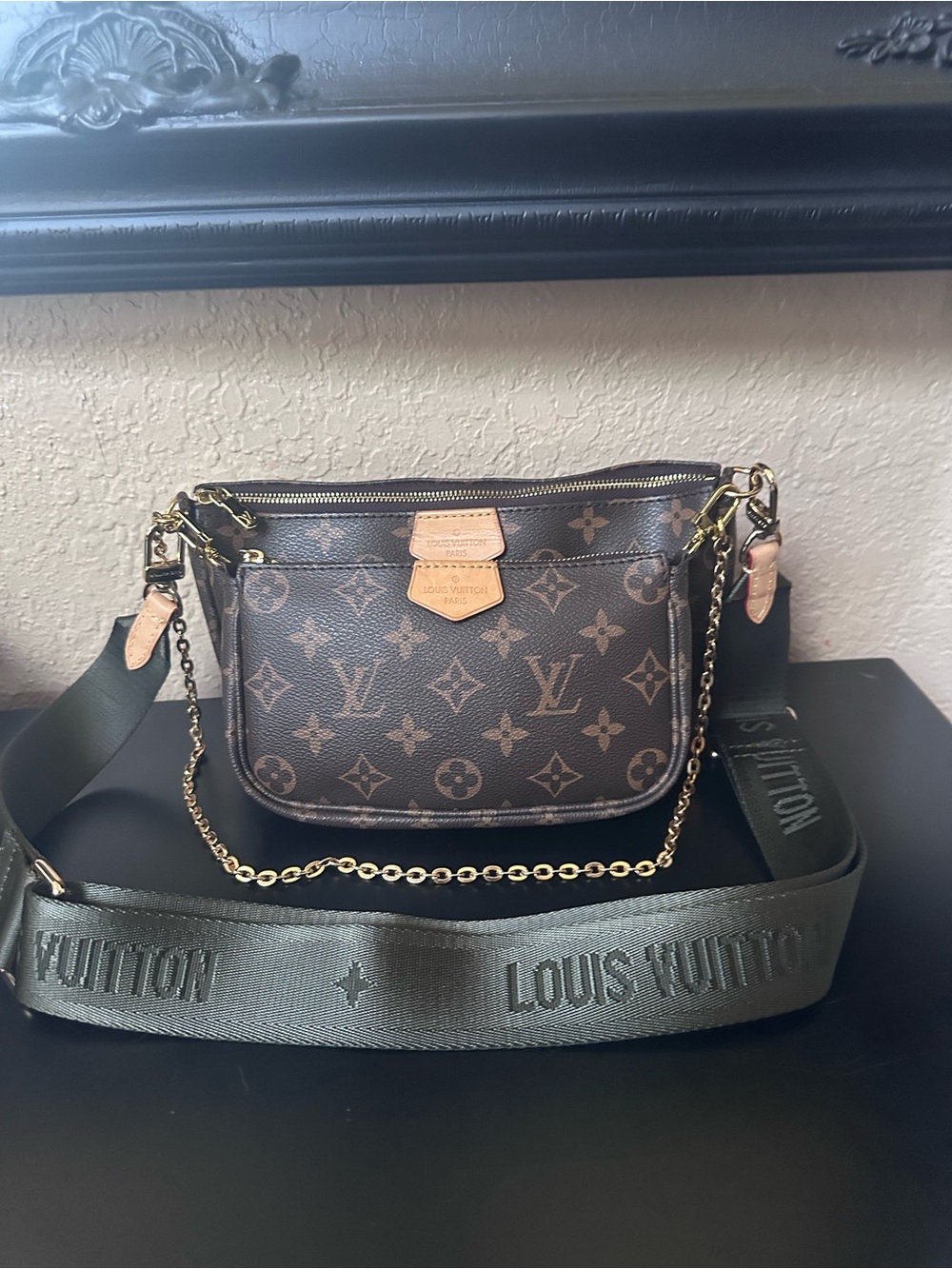 Monogram Multi Pochette with army green strap